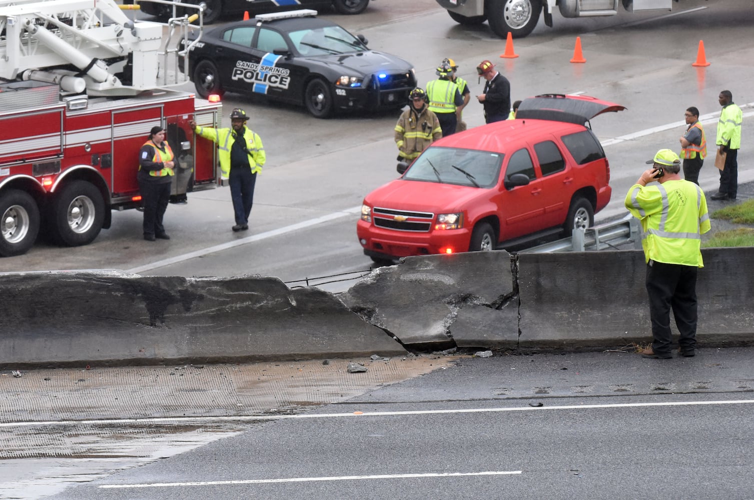 I-285 crash: Trucks plunge off interstate onto Ga. 400