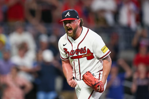 Braves relief pitcher Kirby Yates reacts after striking-out Minnesota Twins pinch hitter Byron Buxton (not pictured) for the save during the ninth inning at Truist Park, Monday, June 26, 2023, in Atlanta. The Braves won 4-1. Jason Getz / Jason.Getz@ajc.com)