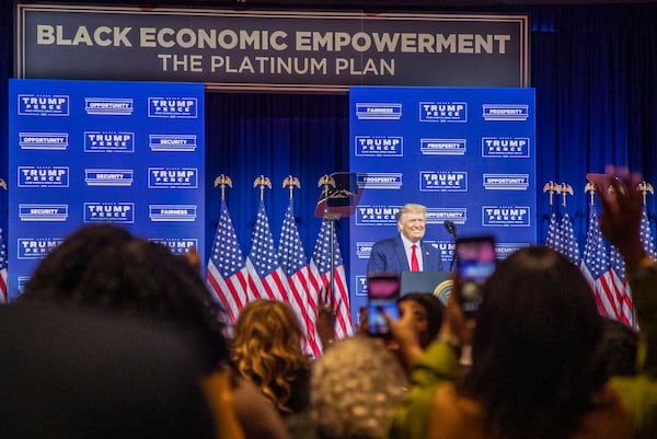 President Donald Trump smiles as the crowd greets him with cheers during a Blacks for Trump campaign rally at the Cobb Galleria Centre in Atlanta, Friday, Sept. 25, 2020.  (Alyssa Pointer / Alyssa.Pointer@ajc.com)