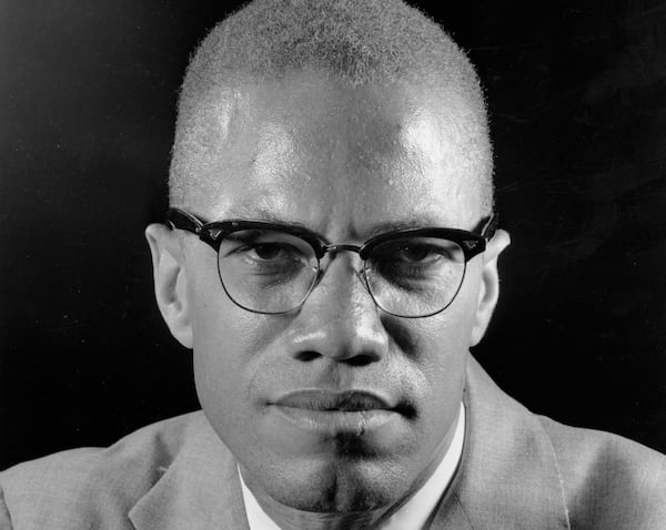 FILE - In this March 5, 1964, file photo, Muslim leader Malcolm X poses during an interview in New York. One of the last major digital holdouts, “The Autobiography of Malcolm X,” should soon be available as an e-book, the attorney for the late activist’s estate told The Associated Press, Friday, Feb. 20, 2015. (AP Photo/Eddie Adams, File)