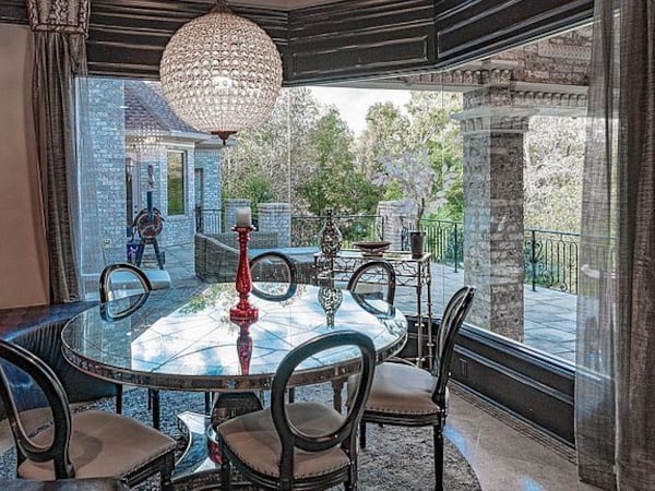 The dining area overlooking the backyard at Tameka "Tiny" Cottle's McDonough home, on sale for $2.2 million. BADON COMMERCIAL REAL ESTATE