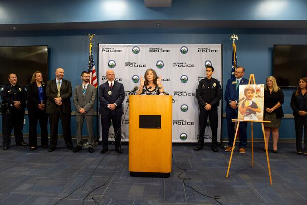 Marlene Carlisle, the aunt of Joshua Harmon, speaks on behalf of the family at a news conference Friday.