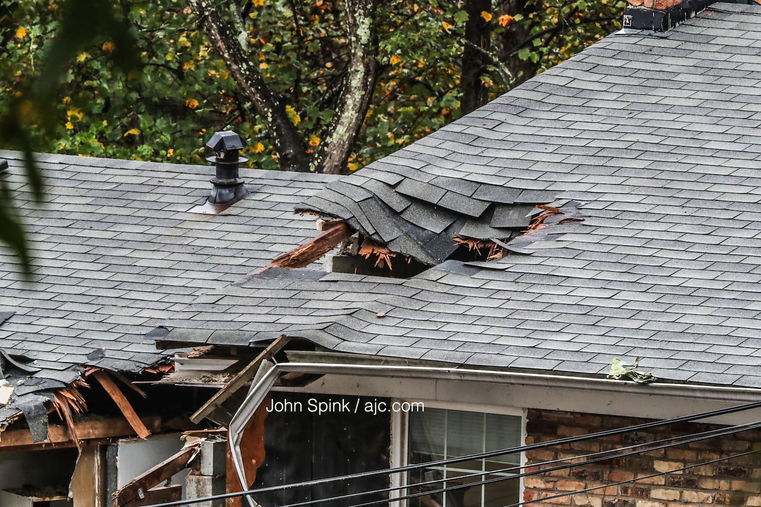 PHOTOS: Plane hits townhome complex in DeKalb County