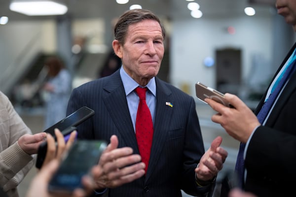 Sen. Richard Blumenthal, D-Conn., speaks with reporters as the Senate works to avert a partial government shutdown ahead of the midnight deadline, at the Capitol in Washington, Friday, March 14, 2025. (AP Photo/J. Scott Applewhite)