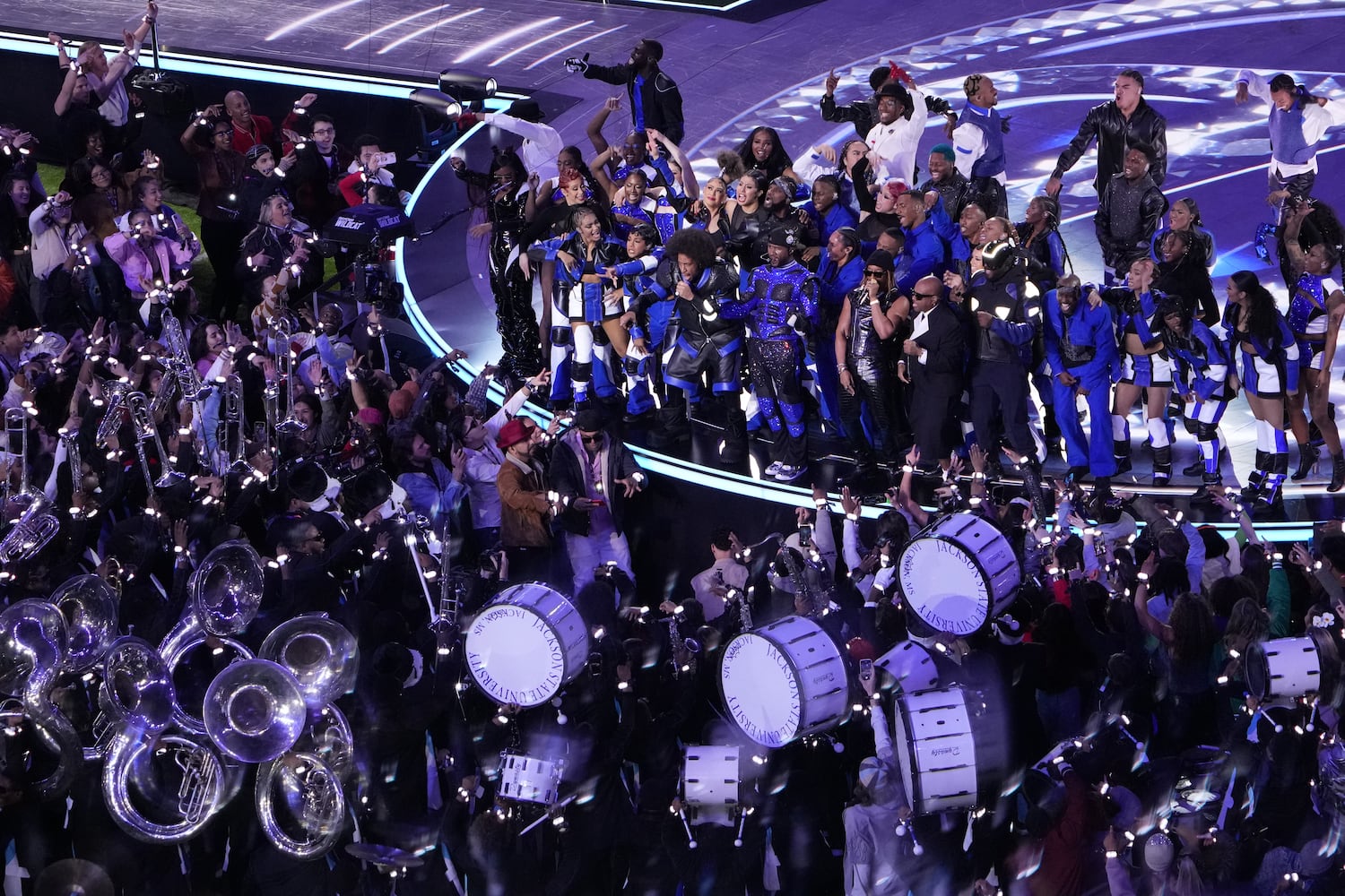 Usher, center, is flanked by Ludacris, left, and Lil Jon as they perform during the Apple Music Super Bowl LVIII Halftime Show at Allegiant Stadium in Las Vegas on Sunday, Feb. 11, 2024. (Doug Mills/The New York Times)