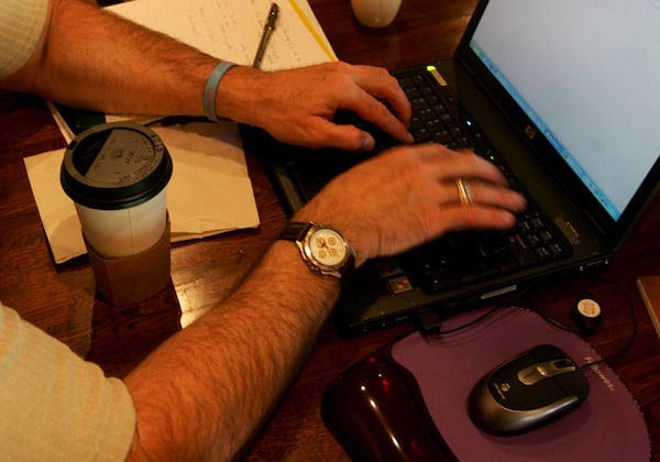 Thousands of Georgians will be teleworking to limit the spread of coronavirus. BRANT SANDERLIN / AJC