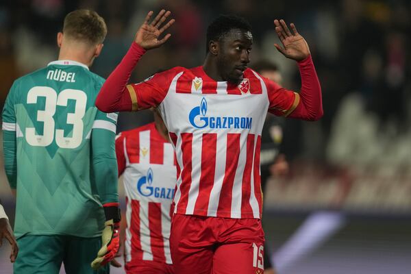 Red Star's Silas, right, celebrates after scoring his side's first goal during the Champions League opening phase soccer match between Red Star and Stuttgart at the Rajko Mitic Stadium in Belgrade, Serbia, Wednesday, Nov. 27, 2024. (AP Photo/Darko Vojinovic)