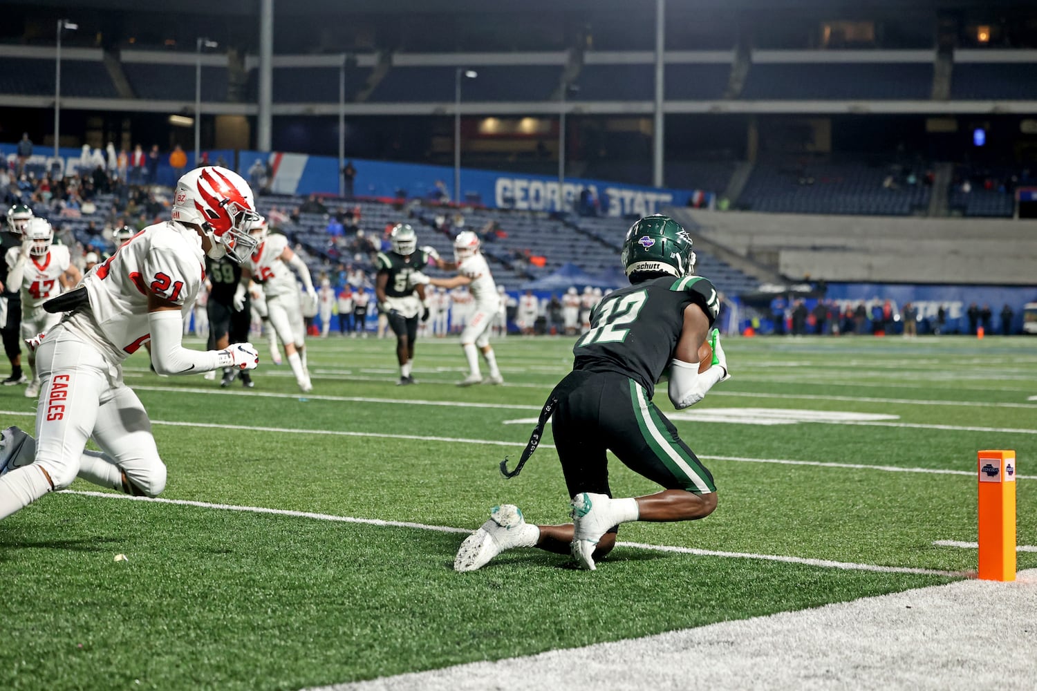 Collins Hill wide receiver Travis Hunter (12) makes a touchdown catch against Milton. JASON GETZ FOR THE ATLANTA JOURNAL-CONSTITUTION



