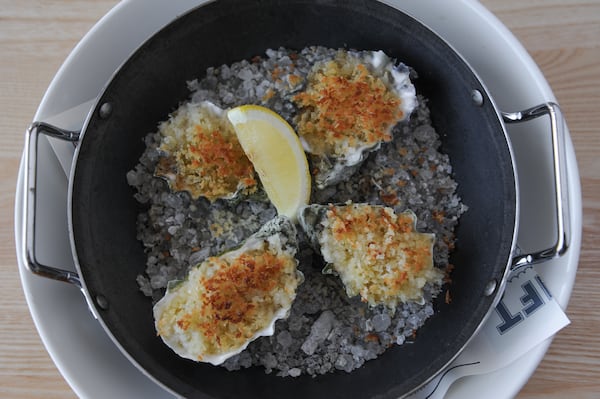 Wood Roasted Oysters- with anchovy garlic butter, breadcrumbs, parmesan and lemon. (Beckystein.com)