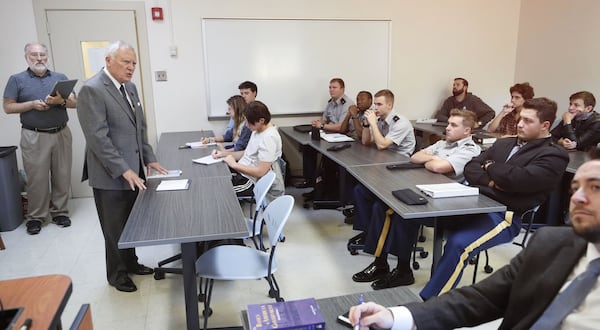  Former Gov. Nathan Deal lectures a class called "Road to Congress" at the University of North Georgia on Oct. 17, 2019.  The state's Board of Regents approved a proposal earlier this year to make the governor a professor teaching law and politics.  