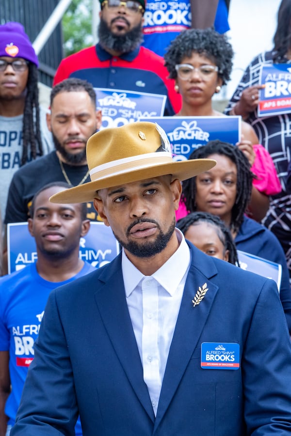 Alfred "Shivy" Brooks kicks off his campaign for the Atlanta Public Schools Board of Education across the street from Maynard Jackson High School on Friday, June 16, 2023. (Jenni Girtman for The Atlanta Journal-Constitution)