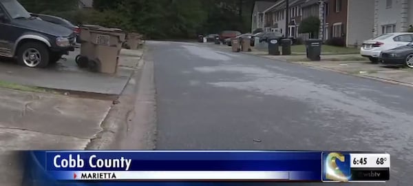 Cobb County authorities are investigating after a woman trying to buy a used car was  pistol-whipped. (Credit: Channel 2 Action News)