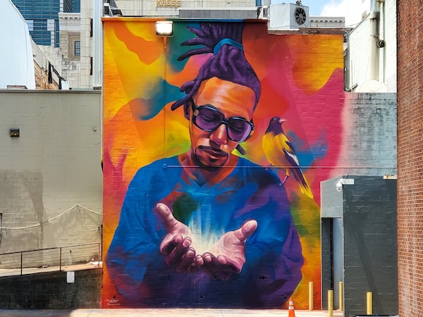 The artist known as Detour (Thomas Evans) painted a mural of fellow artist Hiero Veiga in an interior courtyard along Pryor Street in downtown Atlanta. Courtesy of Arthur Rudick