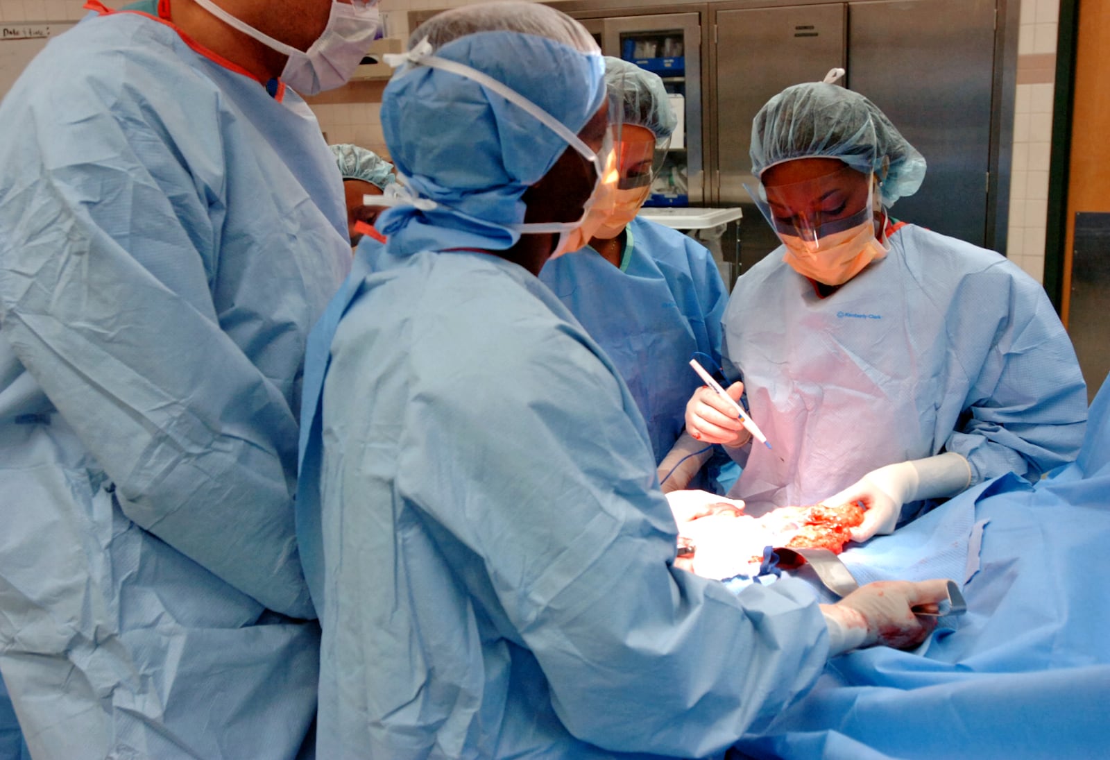 A surgery takes place at Grady Memorial Hospital in Atlanta. A large share of Grady’s patients are uninsured and can’t pay, so the federal government subsidizes the hospital for some of that. The subsidies are now being cut. PHOTO by ELISSA EUBANKS / AJC