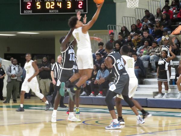 The Swainsboro Tigers' Fred Seabrough attempts a layup in their Class AA semifinal game against the Glenn Hills Spartans on Saturday, Feb. 29, 2020 at Georgia College and State University's Centennial Center in Milledgeville. (Adam Krohn for the AJC)