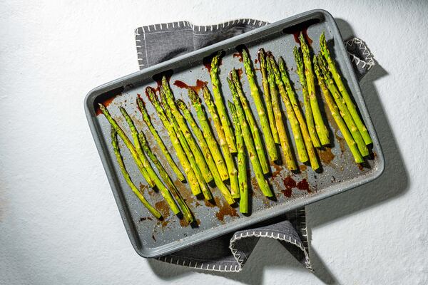 Asparagus can be roasted as the frittata bakes. Photo by Rey Lopez for The Washington Post.