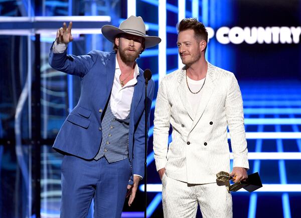 Brian Kelley (left) and Tyler Hubbard of Florida Georgia Line accept the Top Country Song award for 'Meant to Be' onstage during the 2019 Billboard Music Awards at MGM Grand Garden Arena on May 01, 2019 in Las Vegas, Nevada.