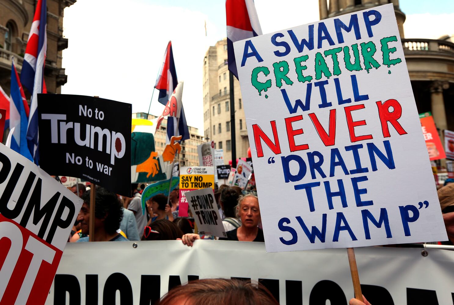 Photos: Protesters greet Trump during UK visit