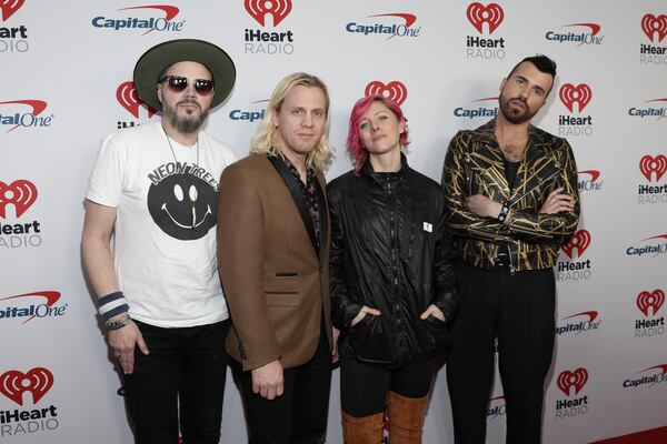 Branden Campbell, from left, Chris Allen, Elaine Bradley and Tyler Glenn of the band Neon Trees attend the 2020 iHeartRadio ALTer Ego concert at the Forum on Saturday, Jan. 18, 2020 in Inglewood. Calif. (Photo by Mark Von Holden/Invision/AP)