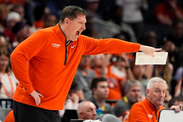 Clemson head coach Brad Brownell yells during the second half of an NCAA college basketball game against the Louisville in the semifinals of the Atlantic Coast Conference tournament, Saturday, March 15, 2025, in Charlotte, N.C. (AP Photo/Chris Carlson)