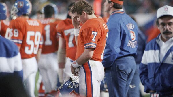 Denver's John Elway stands dejected on the sidelines as the clock winds down in 1988.