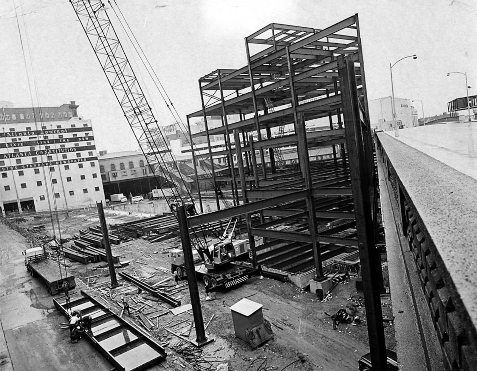 The girders go up in 1969 for a new production building along the Spring Street viaduct. (AJC file)