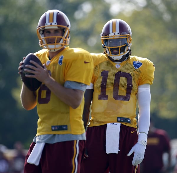 Falcons executive Kyle Smith was with Washington when it drafted quarterbacks Robert Griffin III and Kirk Cousins in 2012. (AP Photo/Alex Brandon, File)