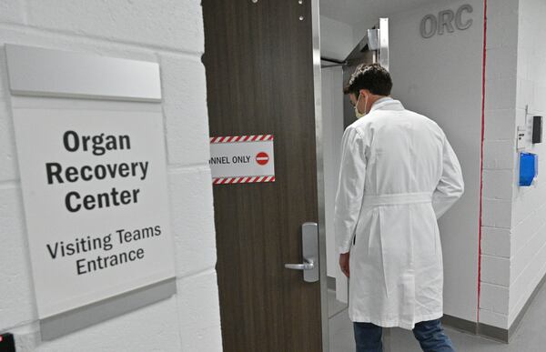 Dr. Clark Kensinger walks into the LifeLink Organ Recovery Center at Piedmont Atlanta Hospital. The new center, a partnership between LifeLink of Georgia and Piedmont Atlanta, is the first of its kind in the state and one of only a few like it in the country. (Hyosub Shin / Hyosub.Shin@ajc.com)