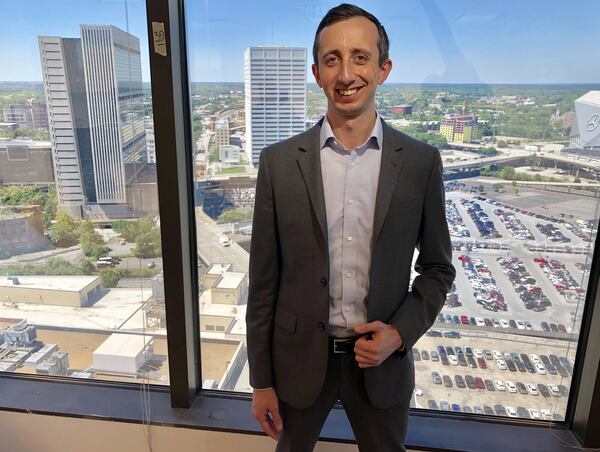 CIM Group First Vice President Devon McCorkle stands in the company’s offices overlooking downtown Atlanta’s Gulch. CIM plans a 40-acre mixed-use development over the active railroad lines and parking lots between Mercedes-Benz Stadium and the Five Points MARTA station. The company plans to call the development Centennial Yards. J. Scott Trubey/strubey@ajc.com