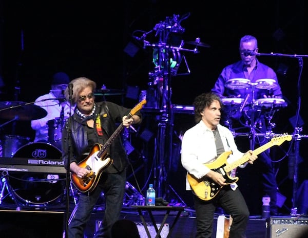  Hall and Oates share a guitar solo. Photo: Melissa Ruggieri/AJC