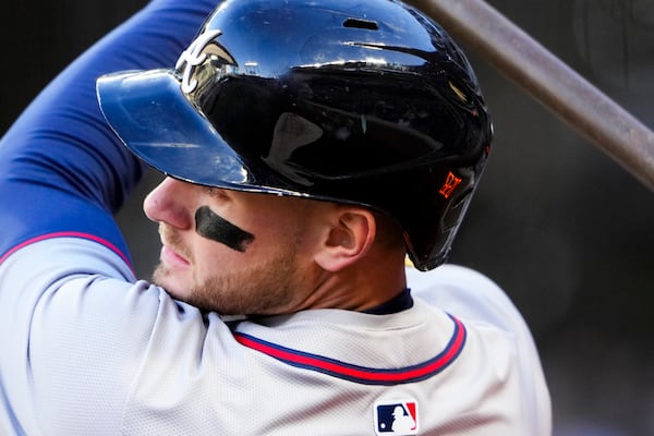 Atlanta Braves' Jarred Kelenic warms up on deck during a baseball game against the Seattle Mariners, Tuesday, April 30, 2024, in Seattle. (AP Photo/Lindsey Wasson)