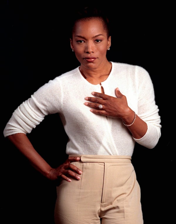 Actress Angela Bassett poses following an interview in New York July 31, 1998. Bassett turned down a lead role in the movie ``Monster's Ball'' because she believed an affair the character had was demeaning and stereotypical, the actress said.``It's about character, darling,'' she told Newsweek for the July 1 issue, which goes on newsstands Monday. ``I wasn't going to be a prostitute on film. I couldn't do that because it's such a stereotype about black women and sexuality.'' (AP Photo/Jim Cooper)