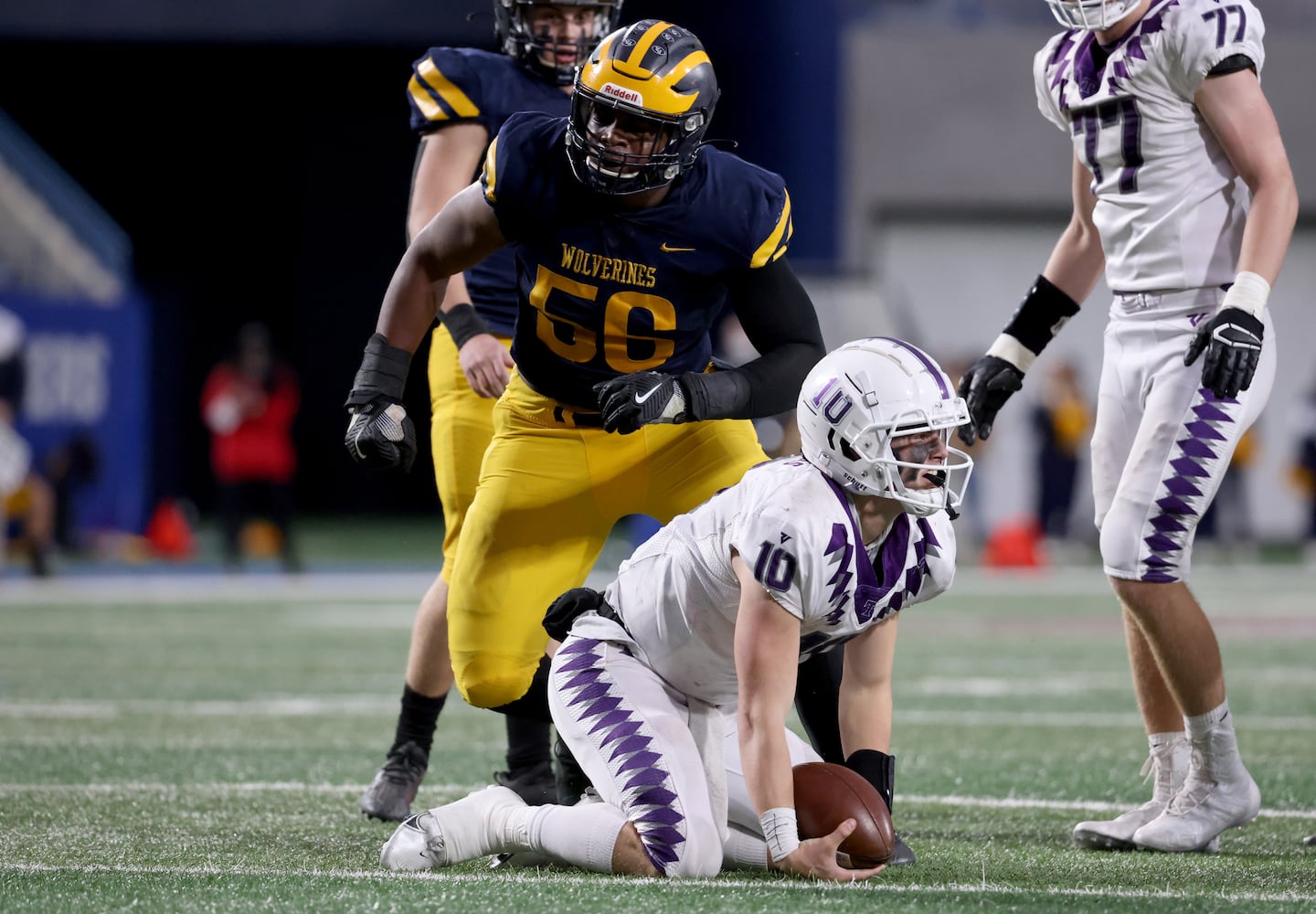 Prince Avenue Christian defensive lineman BJ Green (56) celebrates after he sacked Trinity Christian quarterback David Dallas (10) during the second half of the Class 1A Private championship at Center Parc Stadium Monday, December 28, 2020 in Atlanta, Ga.. Prince Avenue Christian won 41-21. JASON GETZ FOR THE ATLANTA JOURNAL-CONSTITUTION