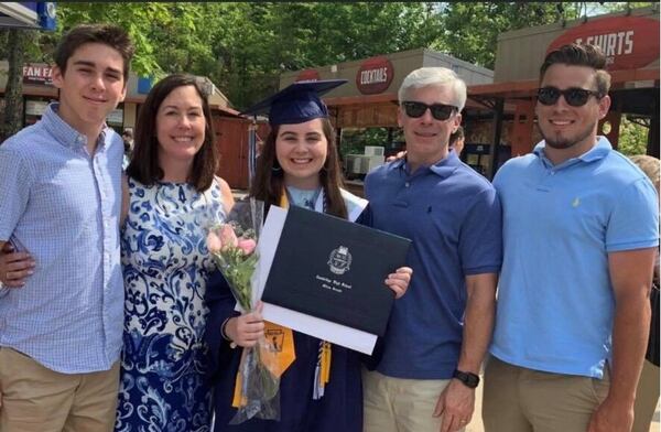 Friends, students and colleagues were in tears throughout the ceremony held at King’s Ridge Christian School for the Leffler family. Katie Leffler, center, survived the boat crash that took place over Memorial Day weekend. She is pictured with her mother Lori and brother Nate, left, and her father Chris and brother Zack, right.