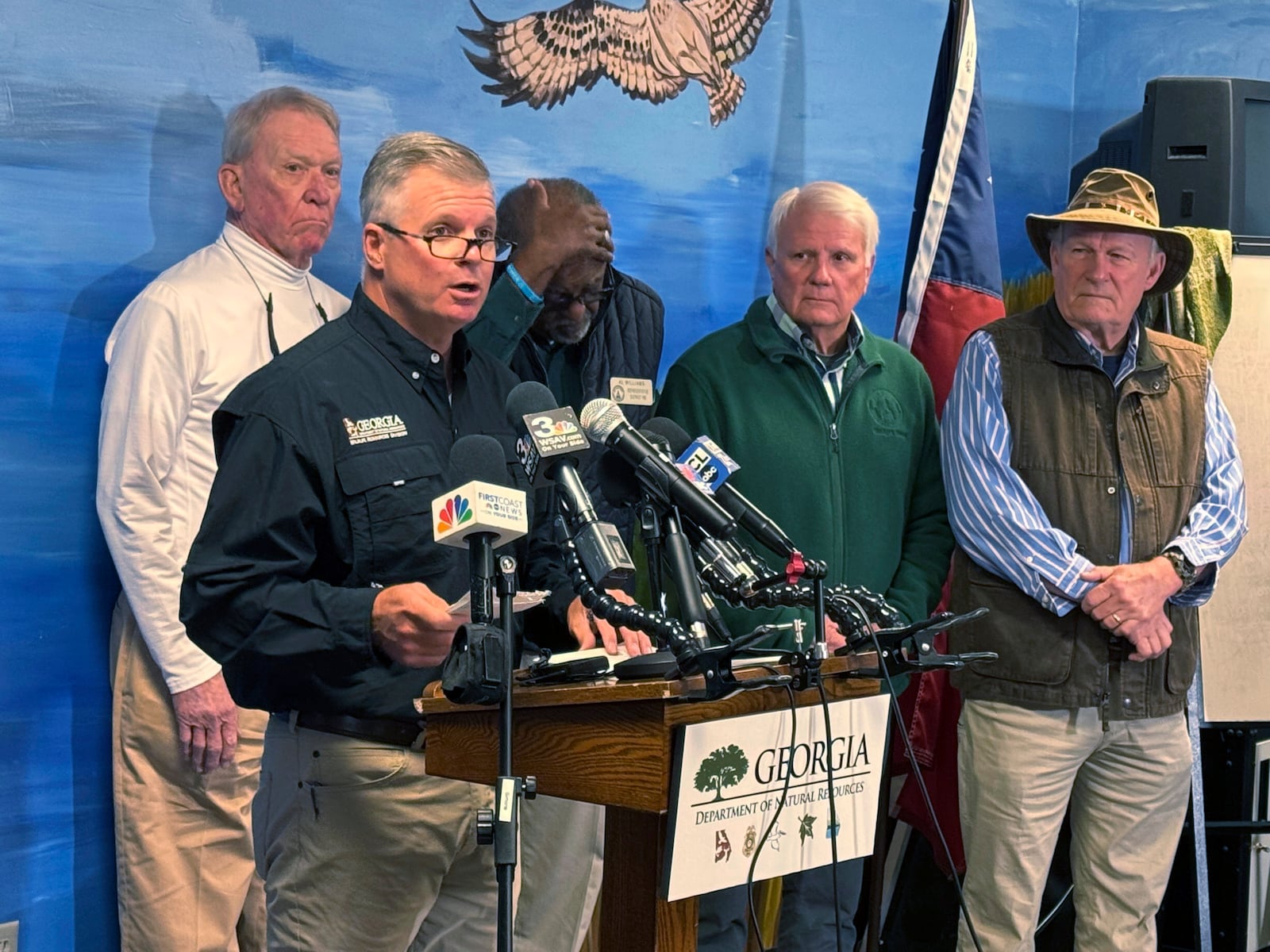 Georgia Department of Natural Resources Commissioner Walter Rabon addresses the media at the Sapelo Island visitors center, alongside Georgia State Rep. Buddy DeLoach, Rep. Al Williams, Ga House Speaker Jon Burns and McIntosh Sheriffs Stephen Jesup Sunday, Oct. 20, 2024. (AP Photo/Lewis Levine)