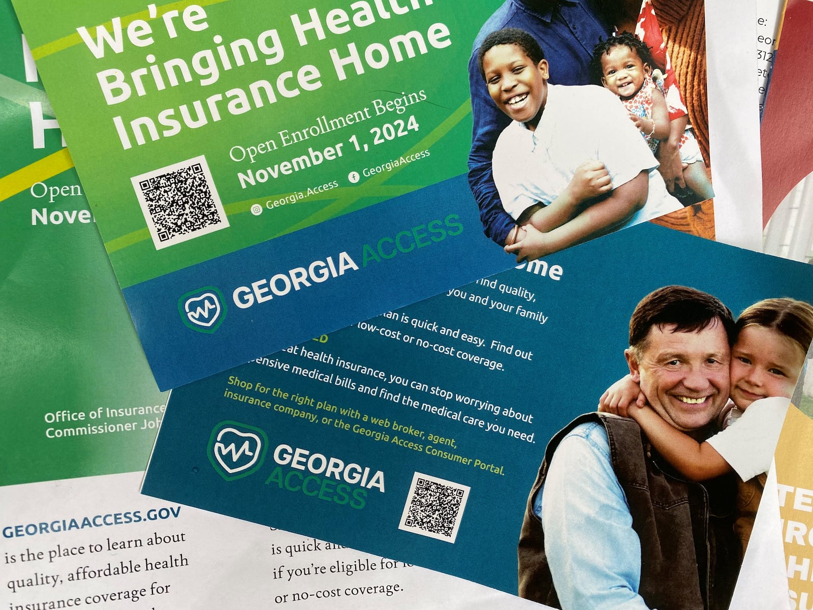 Promotional materials for GeorgiaAccess.gov distributed at a Georgia Access launch event Nov. 1 near the Georgia Capitol. Georgia Access is the new Georgia-based exchange marketplace for the Affordable Care Act. Ariel Hart/AJC