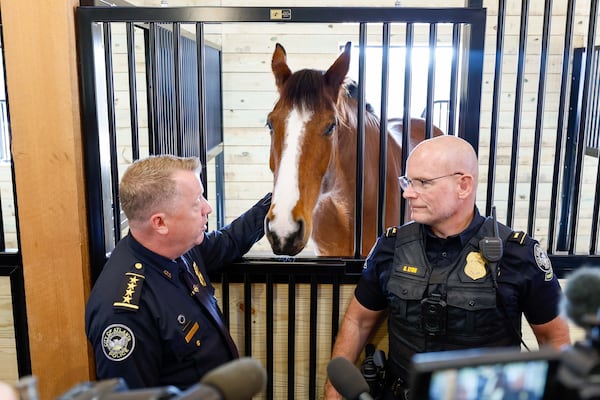 Atlanta Police Chief Darin Schierbaum and Mounting Patrol Unit Lt. Greg Lyon speaks to members of the press during a media tour at the Horse Barn on Tuesday, Dec. 17, 2024. (Miguel Martinez/AJC)