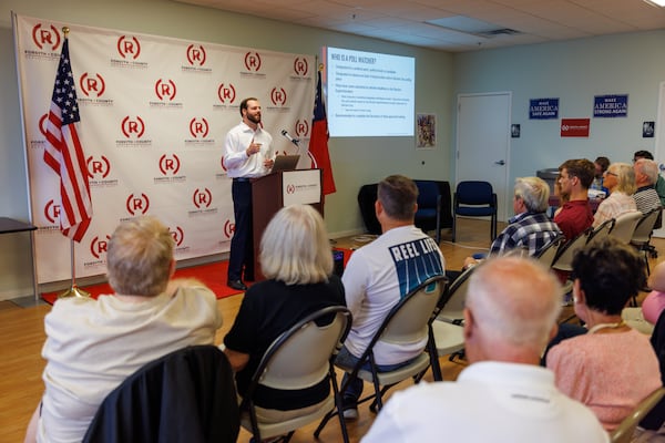 Johnny Moseley, Georgia director for election integrity for the RNC, leads a voter integrity training workshop in Cumming in July. (Arvin Temkar / arvin.temkar@ajc.com)