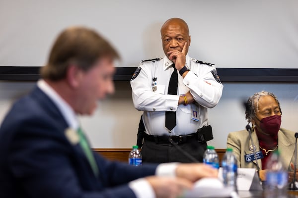 Cobb County Sheriff Craig Owens (center) listens to the Senate Public Safety Committee at the Capitol on March 13, 2024. Owens received $22,600 in donations last year from Talitrix and others with ties to the company. (Arvin Temkar / arvin.temkar@ajc.com)