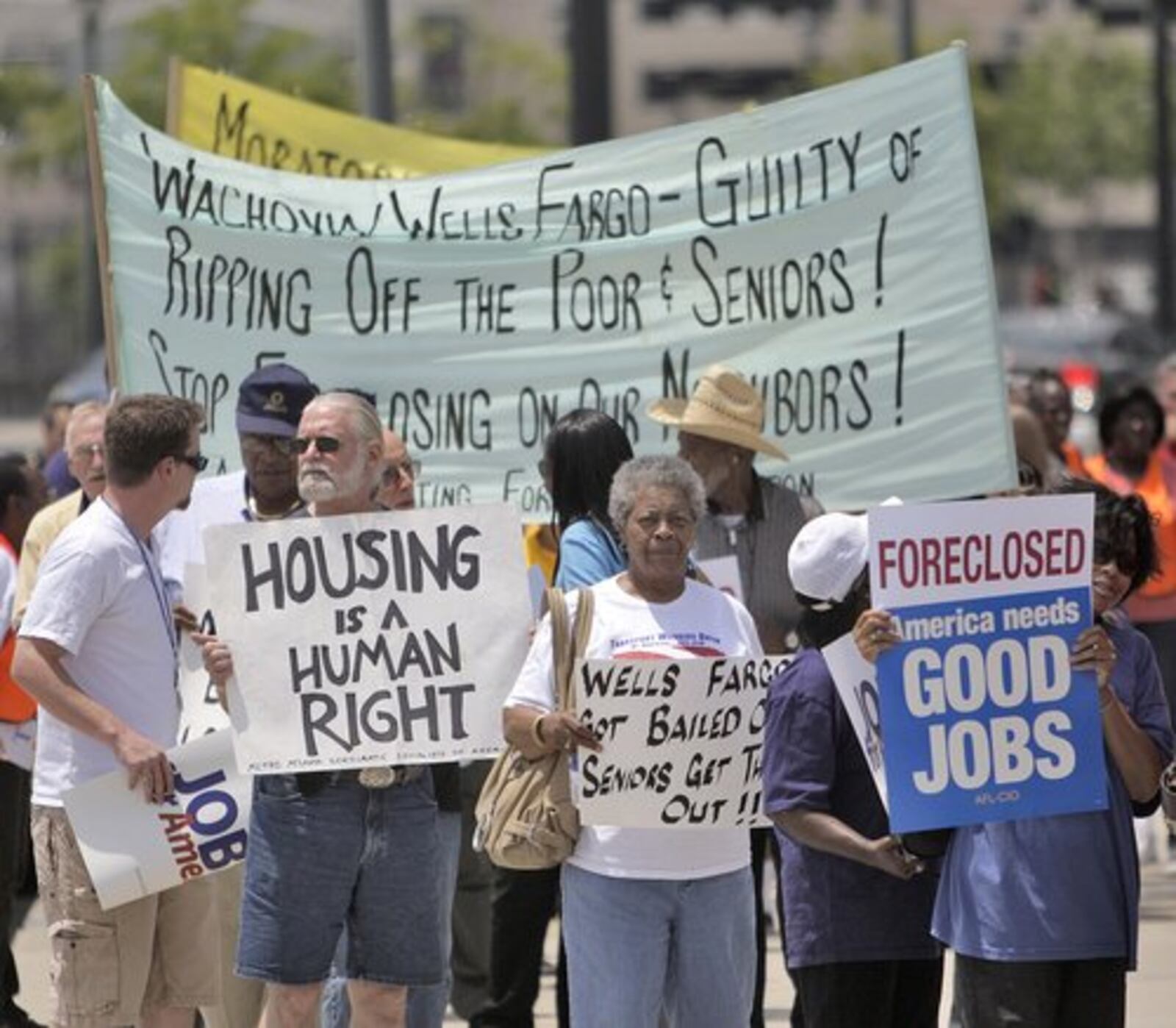 A crowd of about 200 held a rally in front of the Wachovia/Wells Fargo Bank in Atlanta on July 22, 2010. The Atlanta Fighting Foreclosure Coalition, representing more than 40 progressive and civil rights organizations, joined the national and North Georgia AFL-CIO to rally over mortgage modifications. The event was organized by AFL-CIO, a federation of unions whose Georgia chapter represents 100,000 union members statewide.