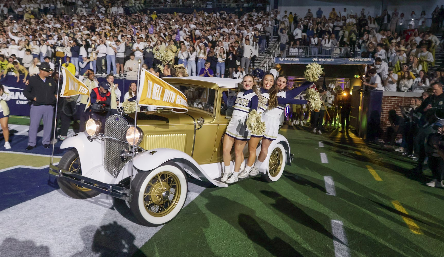 The Ramblin' Wreck leads the team onto the field before an NCAA college football game between Georgia Tech and Syracuse in Atlanta on Saturday, Nov. 18, 2023.  Georgia Tech won, 31 - 22. (Bob Andres for the Atlanta Journal Constitution)