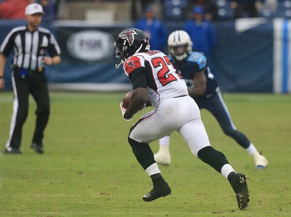 102515 NASHVILLE: -- Falcons safety Robenson Therezie intercepts Titans quarterback Zach Mettenberger in the final minutes of the game to hold on to a 10-7 victory in a football game on Sunday, Oct. 25, 2015, in Nashville. Curtis Compton / ccompton@ajc.com