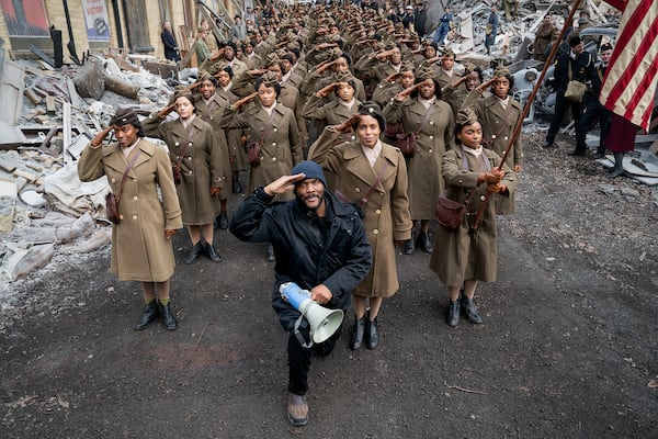 Writer, director and producer Tyler Perry, Kerry Washington and the cast of "Six Triple Eight." (Laura Radford/Perry Well Films 2/Netflix/TNS)