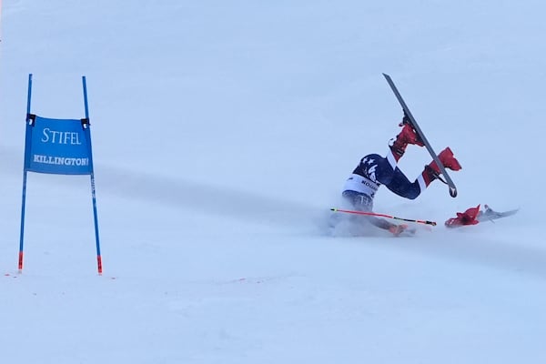 Mikaela Shiffrin, of the United States, crashes during the second run of a women's World Cup giant slalom skiing race, Saturday, Nov. 30, 2024, in Killington, Vt. (AP Photo/Robert F. Bukaty)