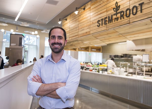 Chad Sunstein, director of campus dining at Emory University, is seen near the Stem to Root food bar at the Dobbs Common Table dining hall. 