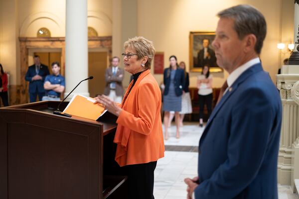 Gov. Brian Kemp said Monday that he had spoken with Georgia Public Health Commissioner Kathleen Toomey that morning about the omicron threat and "we’ll continue to monitor." The governor is seen here with Dr. Toomey giving an update about COVID in Georgia at the State Capitol in September. (Ben Gray for the Atlanta Journal-Constitution)