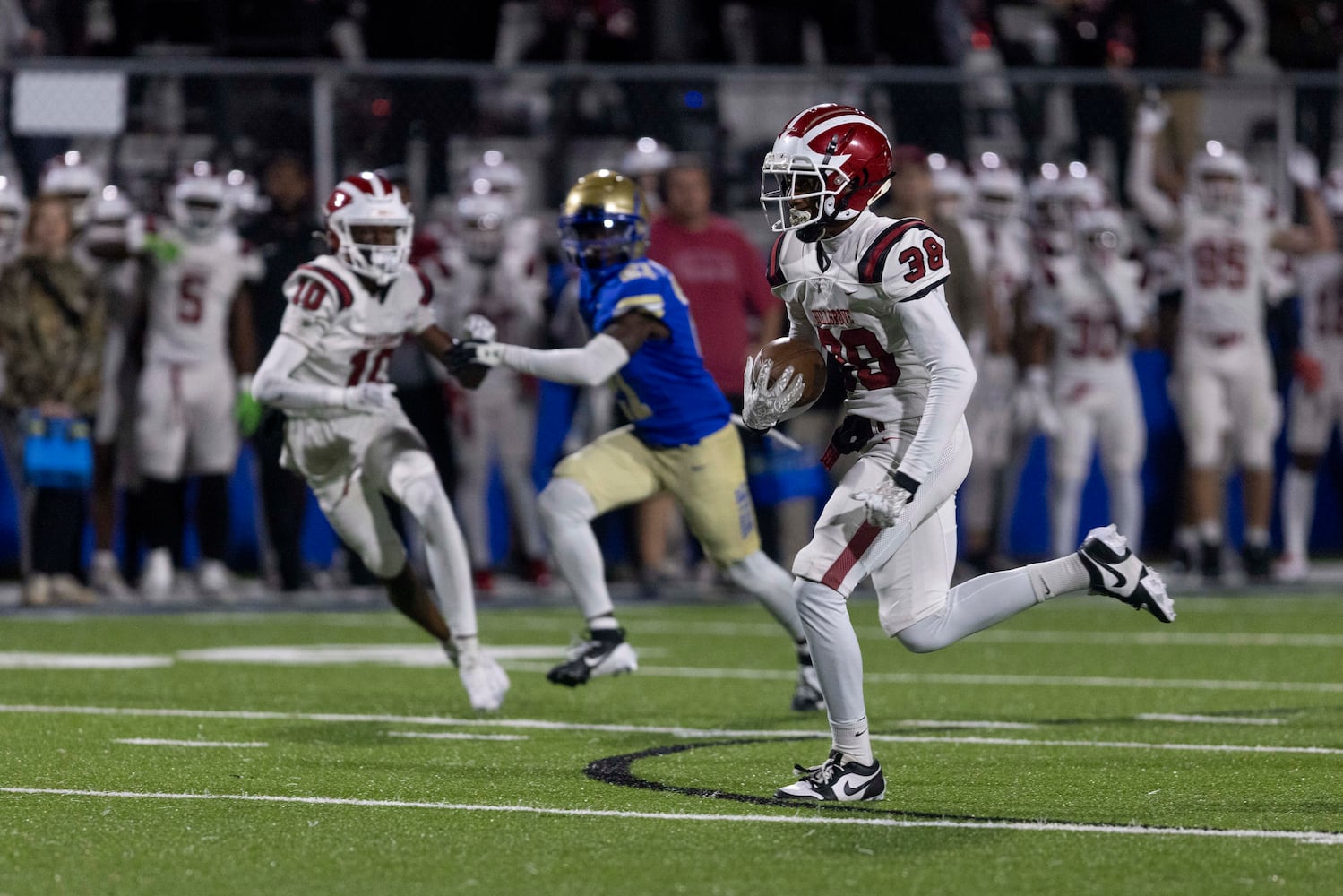 Hillgrove’s Jaiden Moore (38) scores a touchdown during Friday's game between Hillgrove and McEachern at McEachern High School in Powder Springs, GA., on Friday, October 18, 2024. (Photo/Jenn Finch, AJC)