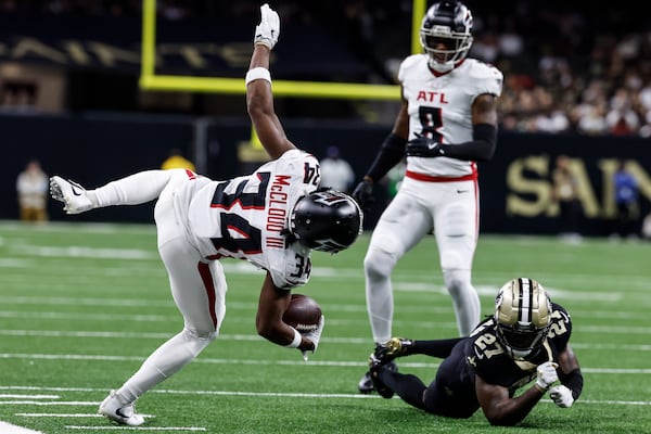 New Orleans Saints cornerback Shemar Jean-Charles (27) hits Atlanta Falcons wide receiver Ray-Ray McCloud III (34) during the second half of an NFL football game, Sunday, Nov. 10, 2024, in New Orleans. (AP Photo/Butch Dill)