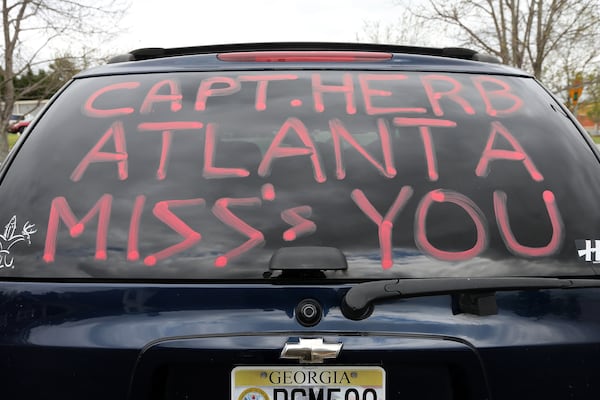 April 15, 2014 Douglasville: Chris Canady, who wrote a special message on the back of his truck, pulls into the visitation for Cpt. Herb Emory Tuesday afternoon April 15, 2014 in Douglasville. BEN GRAY / BGRAY@AJC.COM