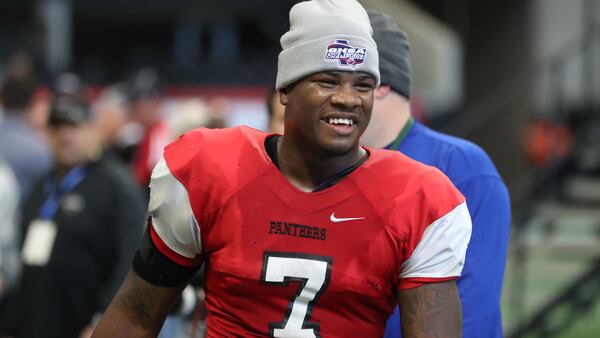 Clinch County linebacker Trezmen Marshall (7), an AJC Super 11 selection, celebrates winning the  Class A public championship.